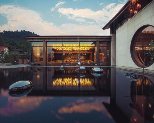 Dusit opens serene lakeside wellness resort with 18 hot spring pools in China 
