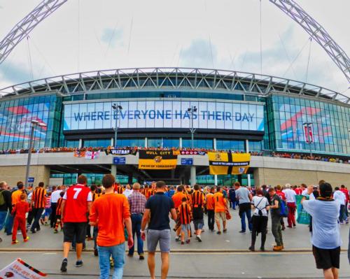 The FA Cup final on 15 May could see a large crowd return to Wembley (picture features fans ahead of the 2014 final)