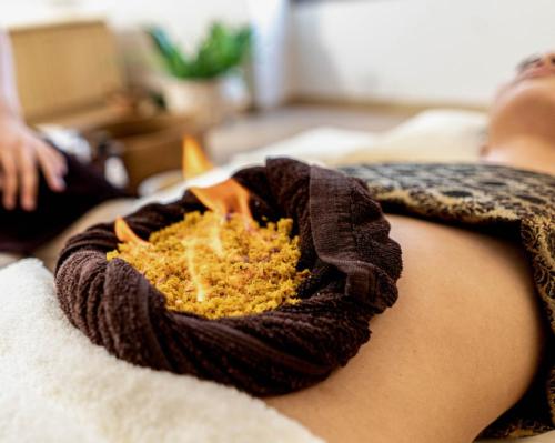 RAKxa’s Long-Covid retreat sees therapists burn herbal paste on guests’ stomachs to detoxify respiratory system