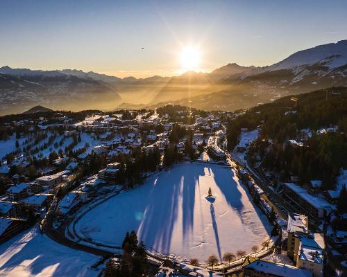 Crans-Montana is a popular alpine skiing destination overlooked by the Swiss Alps