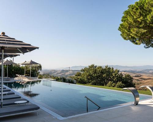 The luxury resort and spa is located in the heart of the Tuscan hills between Florence and Pisa