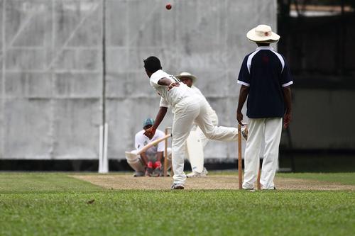 Laws state that a bowler must not extend their arm beyond 15 degrees while delivering the cricket ball