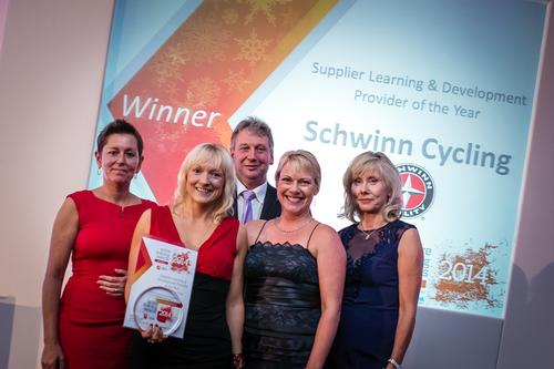 Representatives from Schwinn Cycling collect their award from CIMSPA's David Stalker (centre) and Tara Dillon (left), plus Active IQ's Jenny Patrickson (right) at last year's event