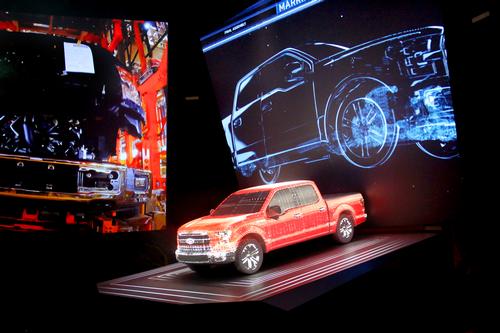 The reimagined theatre is designed to immerse visitors into the world of automobile production