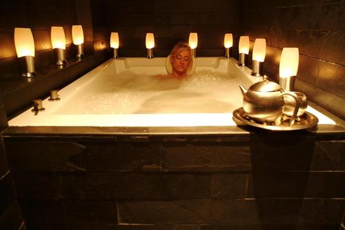 The Bathhouse spa has 4x8ft (1.2mx2.4m) bathtubs under 23ft (7m) ceilings within private rooms