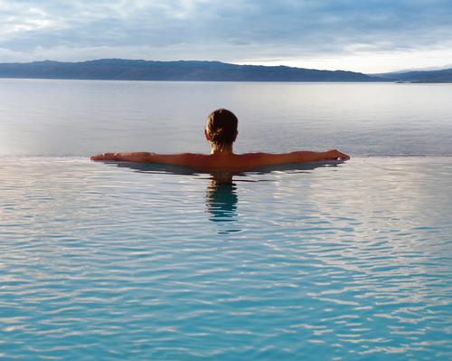 The infinity pool looks out over Loch Fyne to the Isle of Arran