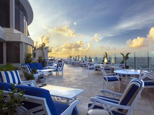 The hotel’s oceanfront terrace provides a pathway to the two new pool lounge areas which are located on either side of the suite towers