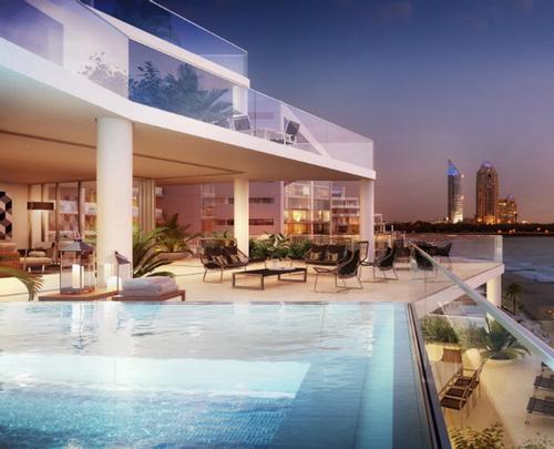 The resort is located in a beachfront location at the base of The Palm Jumeirah