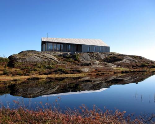 Snøhetta go back to basics with wooden 'social cabin' designed for any landscape