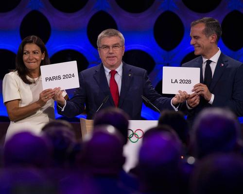 IOC president Thomas Bach (centre) announced the decision at the IOC’s annual meeting held in Lima, Peru