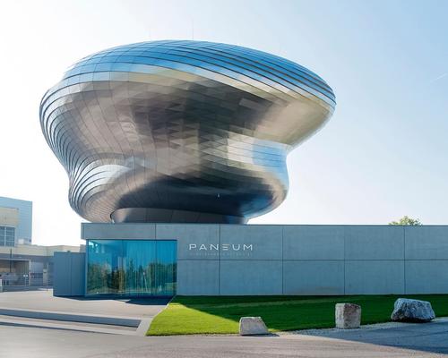 The sculptural new building is located at Backaldrin's headquarters in Asten, northern Austria