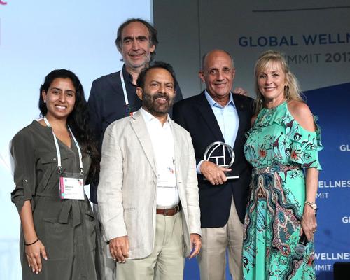 Dr Carmona, fourth from left, holds his award, and is pictured with (L-R) Shama Barot, Omer Isvan, Dilip Barot and Susie Ellis
