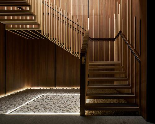 A lightweight floating timber staircase is the centrepiece of the space