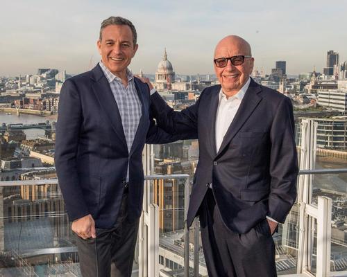 Bob Iger (left) with Rupert Murdoch will continue in his role as Disney chair and CEO until 2021