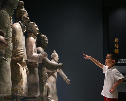 lan Ma, aged five, from Liverpool’s Chinese community, is among the first to see the warriors at World Museum