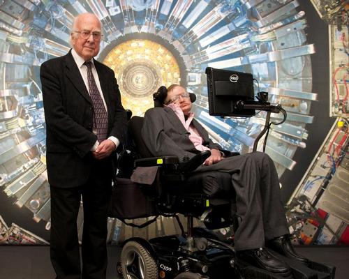 Hawking, pictured in 2013 with Peter Higgs at the Science Museum's Collider exhibition