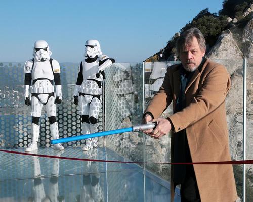 Cutting the ceremonial red ribbon with a lightsaber, Hamil declared that the “Force is strong” with the Skywalk