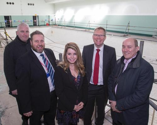 Createability's Ian Cotgrave, Fusion Lifestyle’s Anthony Cawley, Cllr Nick Forbes, Cllr Kim McGuinness, and Stuart Turnbull from Newcastle City Council pose in Newcastle City Pool