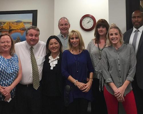 Executives from NFP and EMI Health along with Arizona Spa & Wellness Association president Mia Mackman, third from left