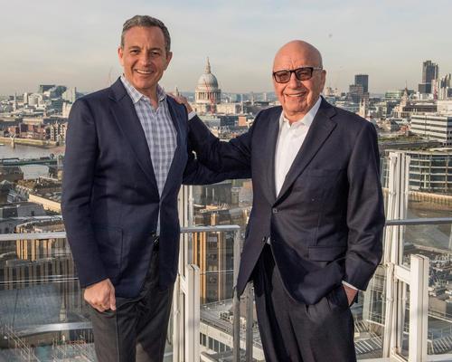 Bob Iger (left) and Rupert Murdoch following the announcement of the original Fox deal 