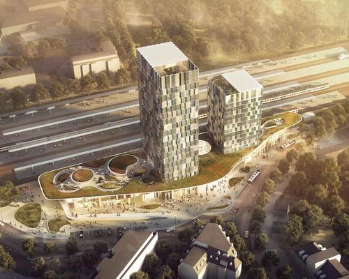 Hamburg-Altona station will house a rooftop green space and two towers on that roofscape, as well as cafes, restaurants, shops, fitness facilities, bicycle parking, waiting areas and entrance lobbies at its base