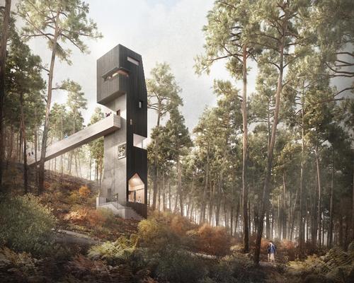 The structure features a bird hide at its peak, offering views of the surrounding tree canopies and allowing visitors to observe the local wildlife