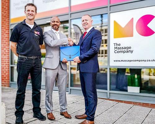Sachdev (centre) will be the first The Massage Company franchisee to service the Midlands 