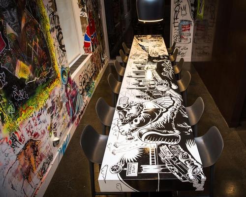 Artist Jason Wasserman designed ÊAT's distinctive tables 