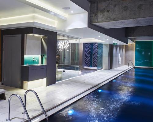On the wellness side, the club contains a range of thermal experiences and a dramatic black swimming pool