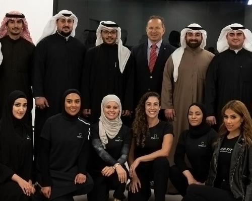 Vivafit CEO Pedro Ruiz (top line, third from right) with the master franchisee team and Vivafit Kuwait fitness staff at the opening of the club