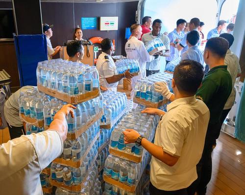 With relief efforts hampered by damage and flooding in the country's airports, the three cruise lines stepped in, sending ships full of supplies to those in need