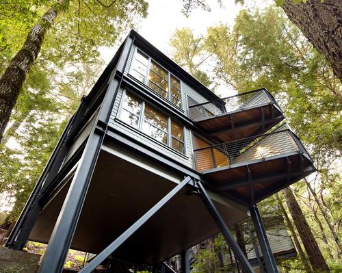 The retreat includes 14 guest rooms in the main retreat lodge encircled by 24 treehouses, and offers 16 acres of grounds designed for self-reflection