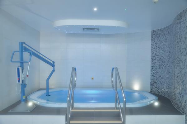 The spa pool features a hoist