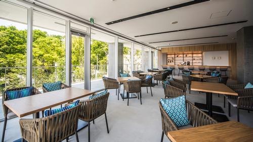 The spa features an upstairs lounge and terrace so guests can relax after a workour / Osamu Matsuba