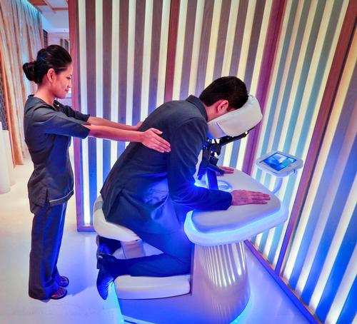 Two express treatment pods feature massage chairs for a quick 12- 25- or 40-minute dry massage / JW Marriott