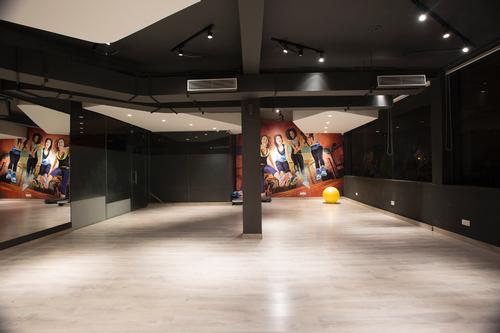 Subtle tones contrast with bright posters and walls with splashes of vibrant colour / Purnesh Dev Nikhanj