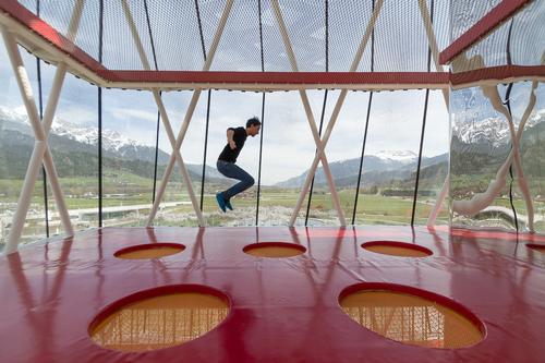 Snøhetta supplied a four-storey outdoor playtower 'completely new and unique in its form' / Snøhetta Architects