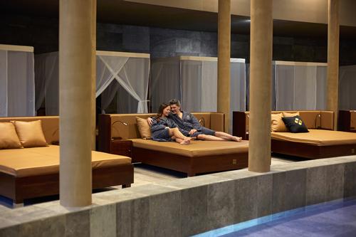 The spa features king-sized relaxation beds with rolls and pillows, giving guests more space and privacy than your average spa