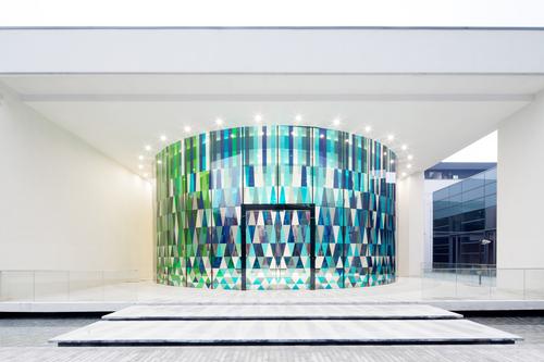 The museum's form represents luck and perfection