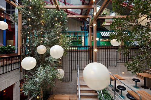 Open spaces are vertically integrated across four levels, encouraging guests to explore the venue, from the street level public bar at the front of the site through to gardens,