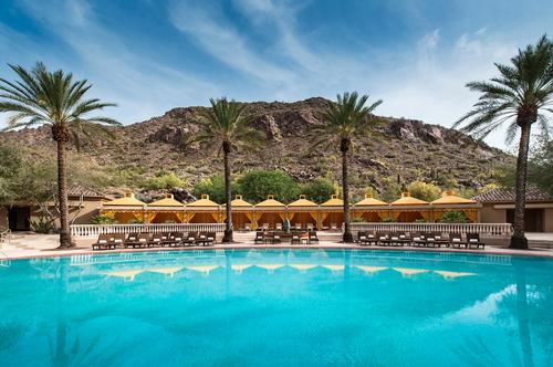 The hotel was originally opened in 1988 on 300 acres (121 hectares) of land at the base of Camelback Mountain / The Phoenician
