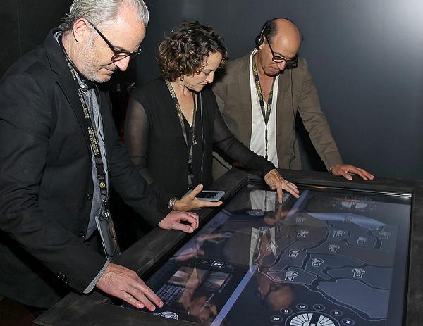 The mobile experience brings added layers to the exhibition, designed to immerse visitors in Panem, the Hunger Games’ world / PHOTO: STARPIX