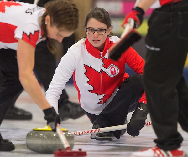 Team Canada in action during the final of the curling mixed team finals at Lillehammer Curling Hall 
