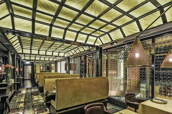 Mott 32 features a large dining area and five private rooms Mott 32 features a large dining area and five private rooms