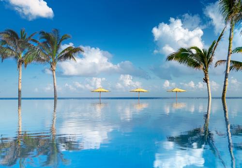 The pool looks out towards the ocean