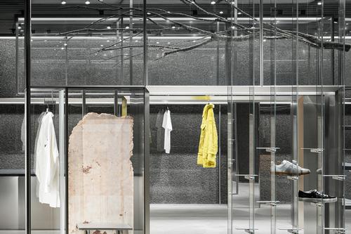 Glass is used to encase products and provide views through the space