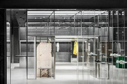 Glass partitions allow views and light through the store