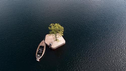 The first of the islands to be released is CPH-Ø1, a small 20sq m, hand-made wooden platform with a linden tree at its centre / www.marshallblecher.com