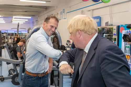 The PM's visit was hosted by Gym Group COO Barney Harrison (left) / Barney Harrison/LinkedIn/The Gym Group
