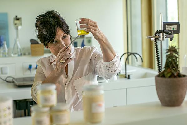 Isabelle Reboulle, head chemist, working at the Davines Village R&D Lab